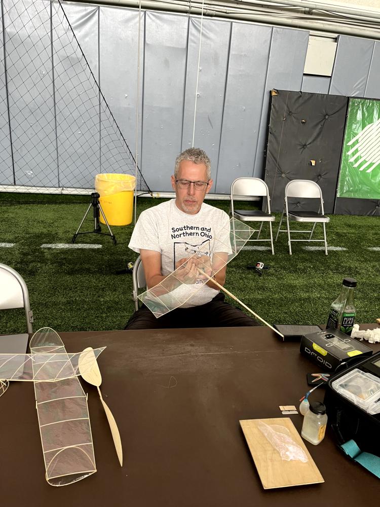 John Kagan setting up his Open Pennyplane.