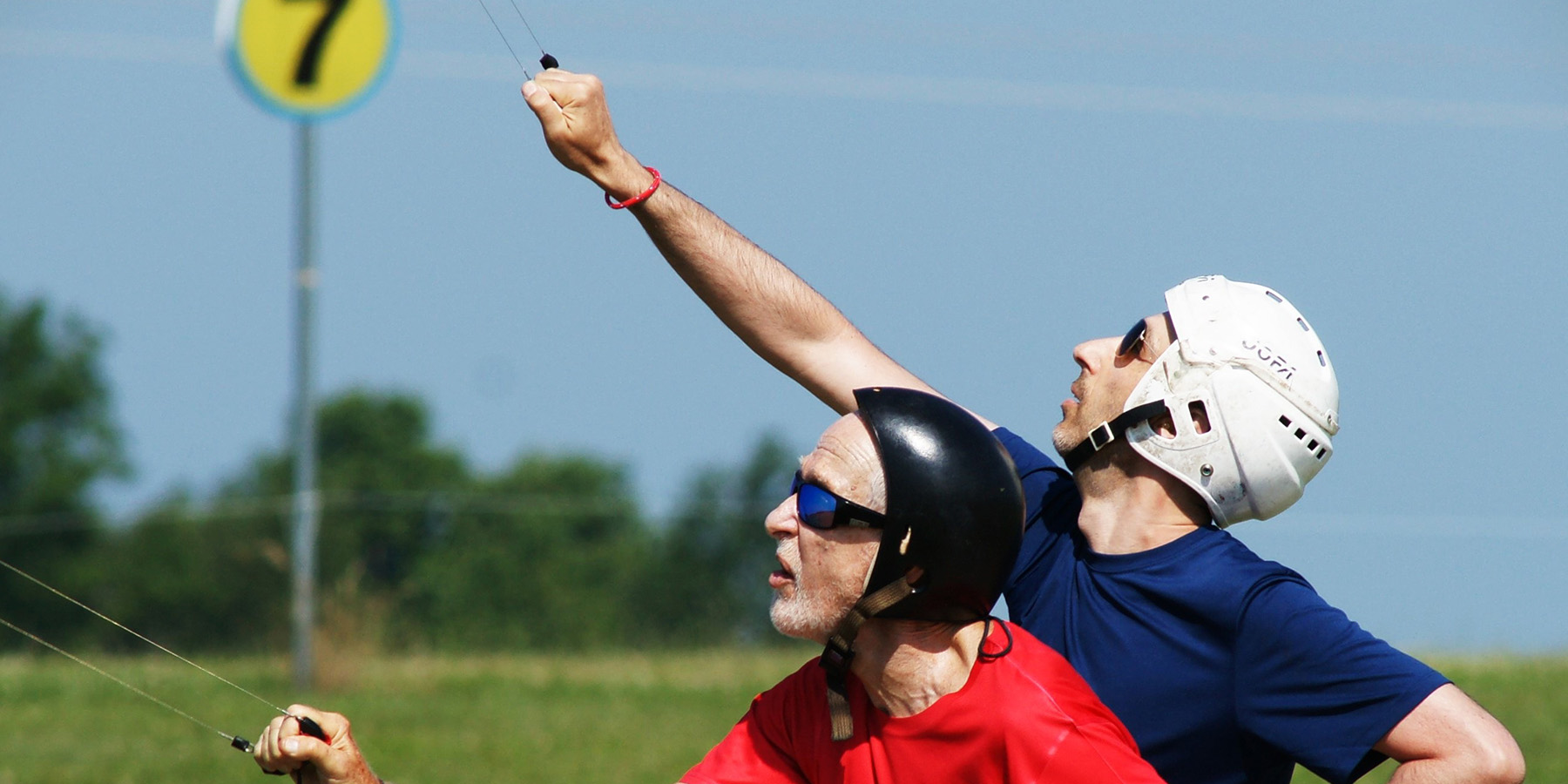 Chuck Rudner (foreground) and Mark Rudner flying a cool and controlled first round match, which Mark won.