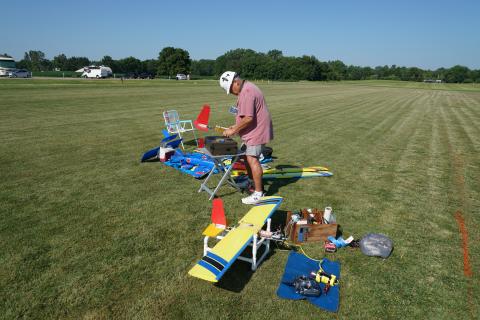 Tim Gillow tinkering with his birds.