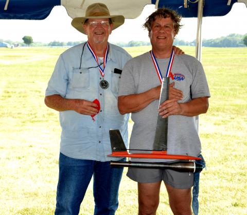 Patrick with Bill Lee and his medal.
