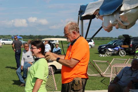 Hope Finn gets her Blue Max from George Bredehoft.