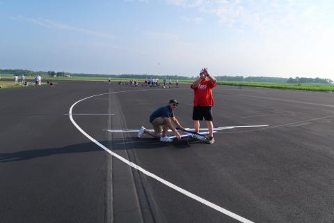 James Mills signaling the judges while Kenny Stevens holds for a launch.