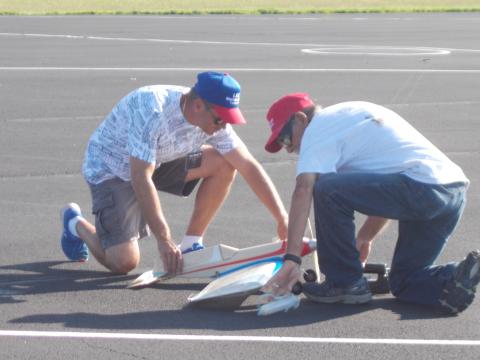 Jim Lee getting ready for an official flight with his son Todd launching.