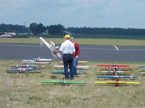 Mark Weiss and Mike Eber look over the planes with a very watchful eye.