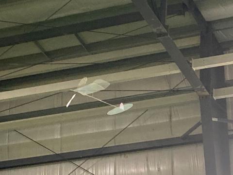 A lighter-than-air model floats.