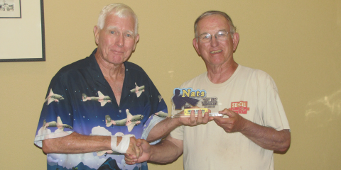 Paul Smith receives his trophy for first place for Class II. He also placed third in Profile Carrier.